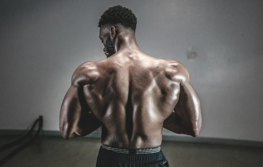 pexels-photo-2092479-2092479 Man Flexing Muscle